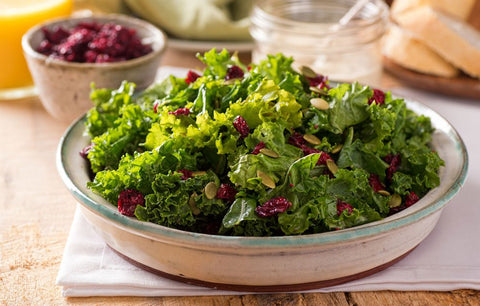 Kale Salad with Pumpkin Seeds and Cranberries